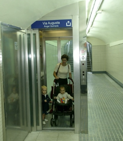 Photo of a family getting out of an elevator